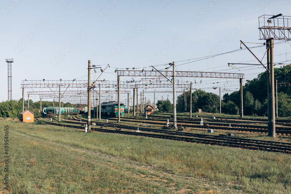 Passenger train moves fast at sunset time. Passenger train moves fast at sunset time.