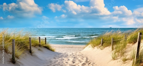 Path leading past the beach to the ocean