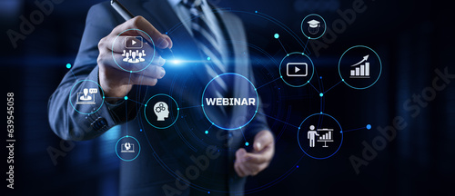 Webinar online learning education concept. Businessman pressing button on screen.