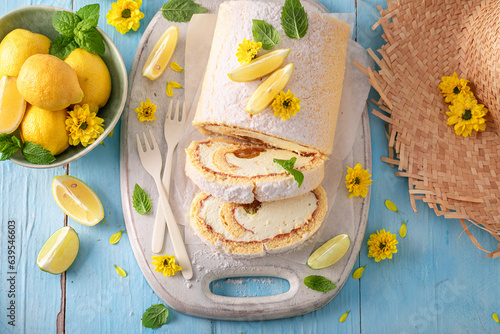 Obraz na płótnie Homemade mango swiss roulade as summer cake.