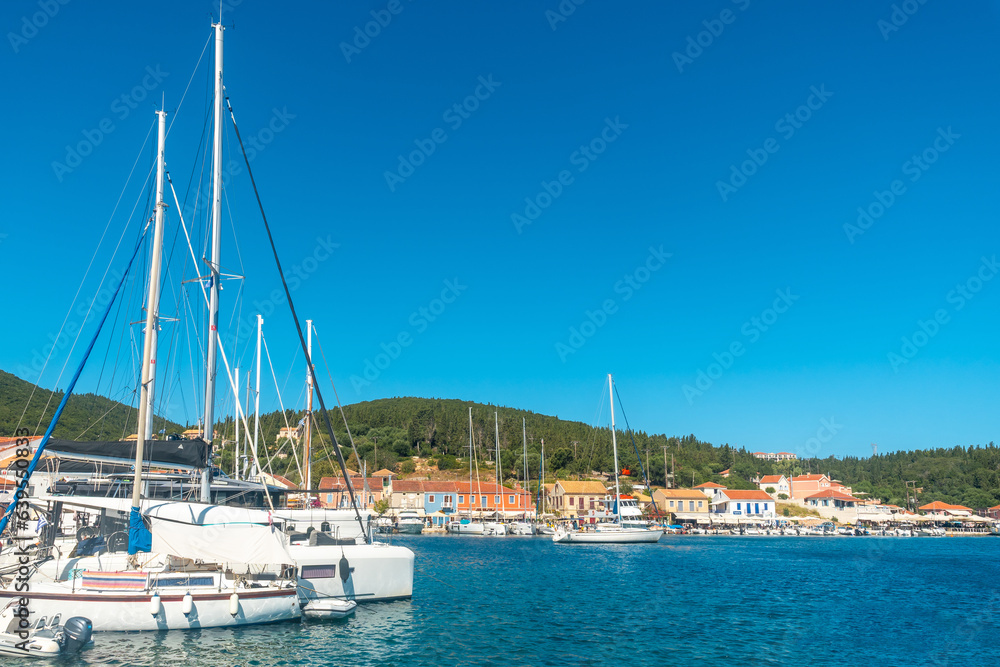 Boats in the port of Fiskardo village on the island of Kefalonia, Greece