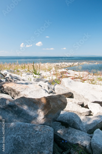 Lake Uvildy in summer with boulders on its shore, South Ural, Russian Federation photo