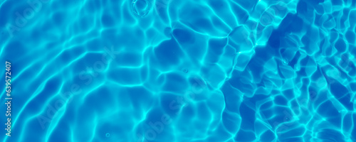 Abstract transparent water shadow surface texture natural ripple on blue background