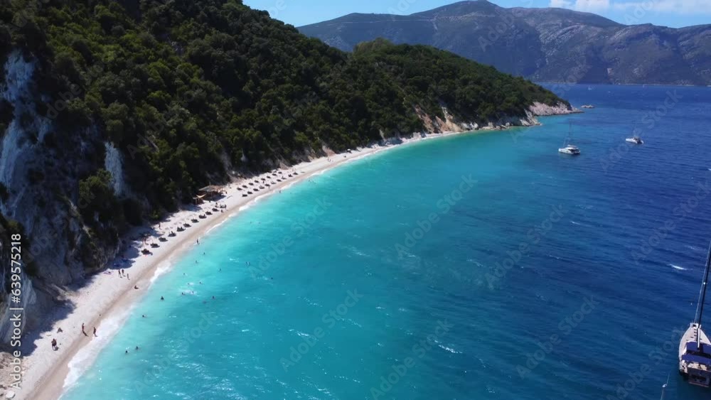 Aerial view of the paradise beach with turquoise water of Gidaki on the island of Ithaki or Ithaca in the Ionian sea in the Mediterranean sea of Greece Aerial view of the paradise beach with turquoise water of Gidaki on the island of Ithaki or Ithaca in the Ionian sea in the Mediterranean sea of Greece
