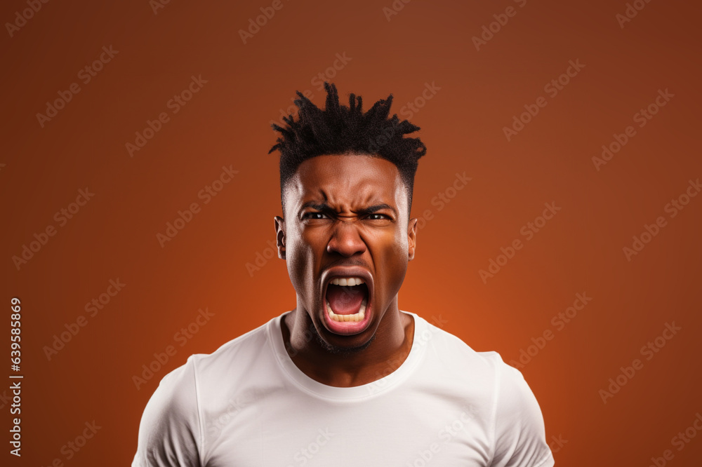 Young African American man wearing a white t-shirt standing on a brown background with a serious expression.