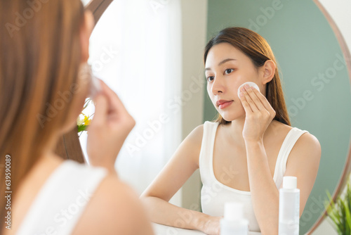 Photos Happy beauty, attractive asian young woman, girl looking reflect in mirror, hand