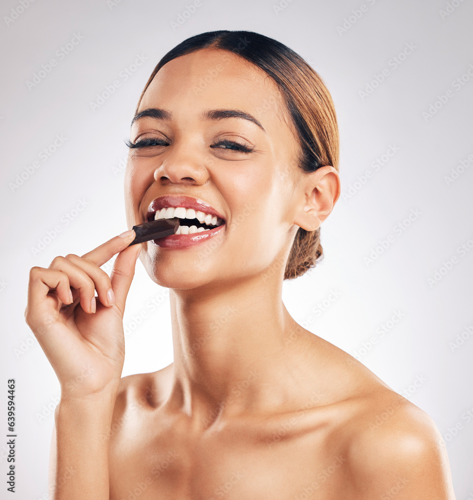 Chocolate, smile and portrait of woman in studio with diet, detox or sweet, unhealthy and snack on white background. Happy, face and female model with sugar, candy bar or eating cocoa treats isolated Chocolate, smile and portrait of woman in studio with diet, detox or sweet, unhealthy and snack on white background. Happy, face and female model with sugar, candy bar or eating cocoa treats isolated