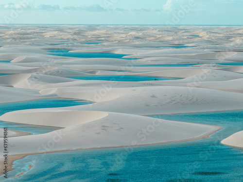 Aerial view of Lencois Maranhenses. White sand dunes with pools of fresh and transparent water. Desert. Barreirinhas. Maranhao State National Park. Brazil photo
