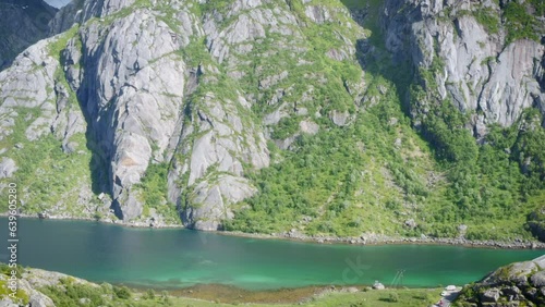 Drone view at Djupfjord with beautiful turquoise sea water near Henningsvaer in Lofoten, Norway photo