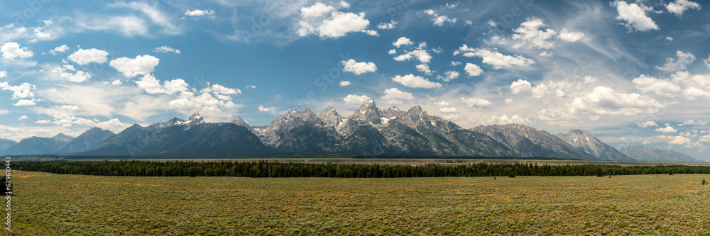 Fluffy Clouds Over Grand Teton Panorama
