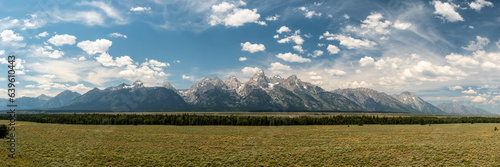 Fluffy Clouds Over Grand Teton Panorama