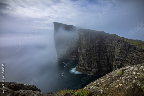 Slave cliff in the mist  Traelanipa  Vagar  Faroe Islands 