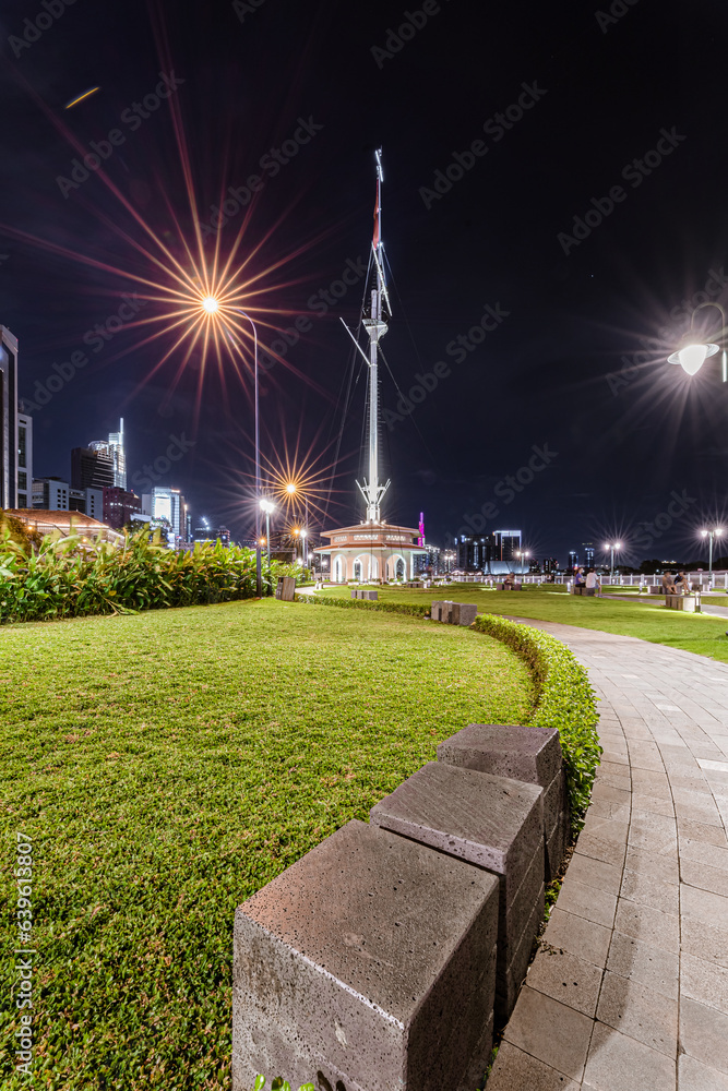 Naklejka premium Ho Chi Minh City skyline and the Saigon River at night.