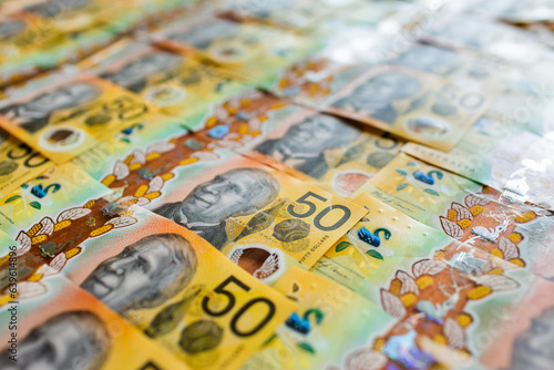 rows of bank notes, each the value of fifty Australian dollars photo