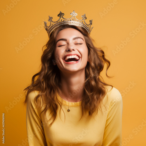 Woman with a crown on a yellow background.