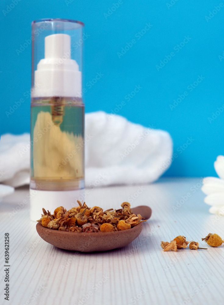 Natural chamomile skin toner in a transparent spray bottle Natural chamomile skin toner in a transparent spray bottle