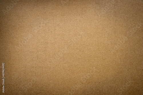 Kraft paper, old brown recycle cardboard box paper abstract pattern texture background.