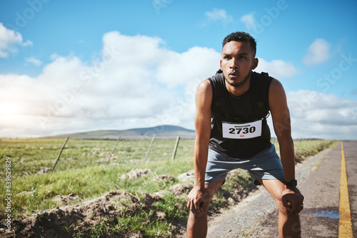 Tired, sports and man with fitness, wellness or exhausted with workout, breathing or training. Person, runner or athlete outdoor, exercise or fatigue with rest, challenge or sweat with intense cardio