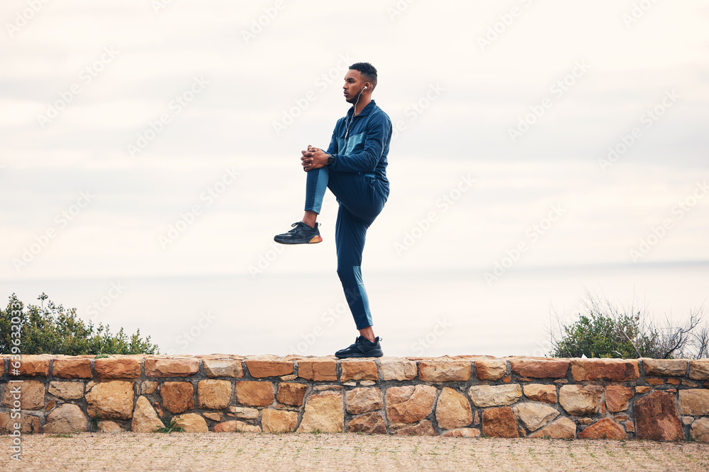 Fitness, man stretching legs and outdoor running workout on road for health and wellness. Sports, motivation and healthy mindset, training and stretch for runner exercise or marathon with headphones. Fitness, man stretching legs and outdoor running workout on road for health and wellness. Sports, motivation and healthy mindset, training and stretch for runner exercise or marathon with headphones.
