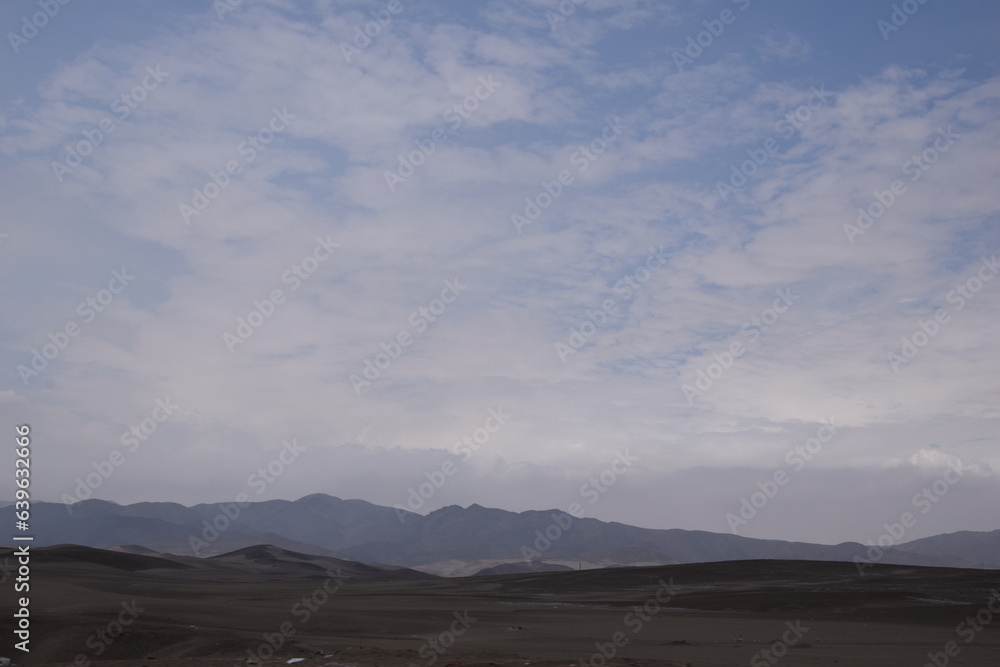 Pretty sky in peru desert next to road