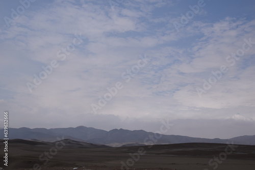 Pretty sky in peru desert next to road © Emily_C_Burke