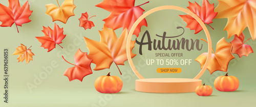 Autumn Display Podium Decoration Background with Autumn leaves and empty minimal podium pedestal product display.Background or banner template for the design of Autumn and Fall Banners