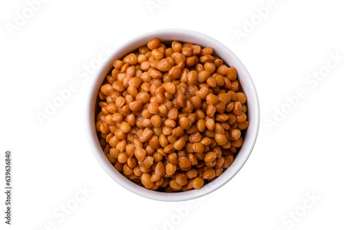 Delicious healthy canned lentils in a ceramic ribbed white bowl photo