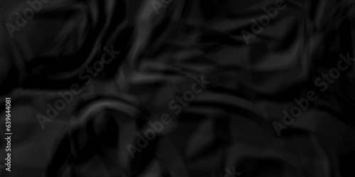 Dark crumple black paper wrinkled poster template ,blank glued creased paper texture background. black paper crumled backdrop background. used for cardboard and clarkboard.