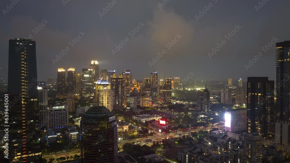 night illumination jakarta city downtown district traffic street aerial panorama 4k timelapse indonesia night illumination jakarta city downtown district traffic street aerial panorama 4k timelapse indonesia