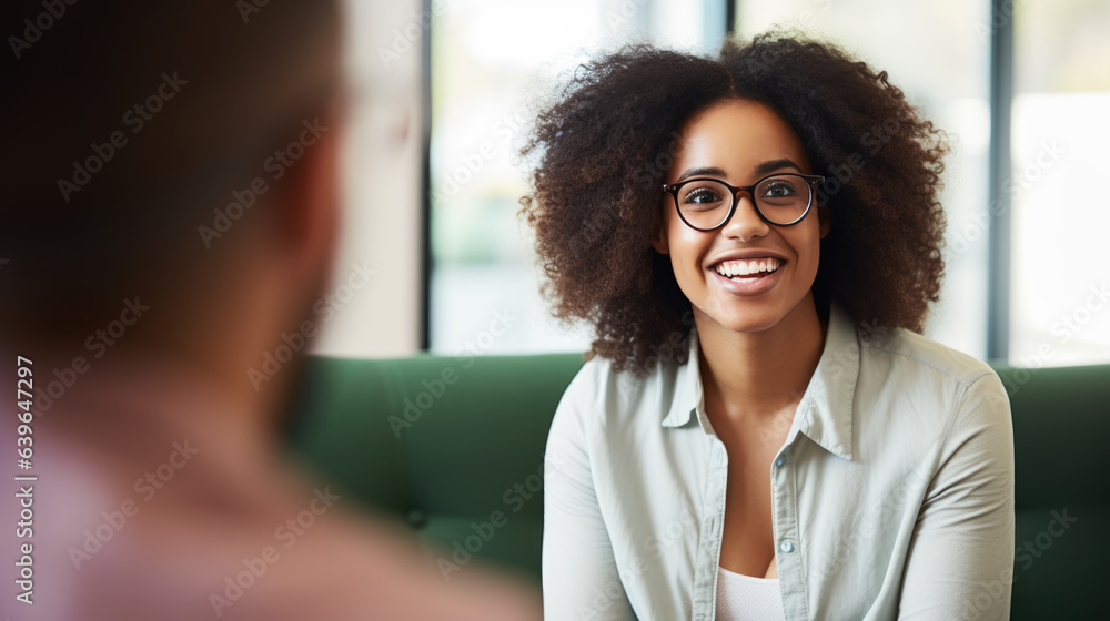 Young happy woman talking with psychologist at clinic, session of rehab therapy Young happy woman talking with psychologist at clinic, session of rehab therapy