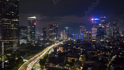Wallpaper Mural night illuminated jakarta city downtown traffic street road aerial panorama 4k timelapse indonesia Torontodigital.ca