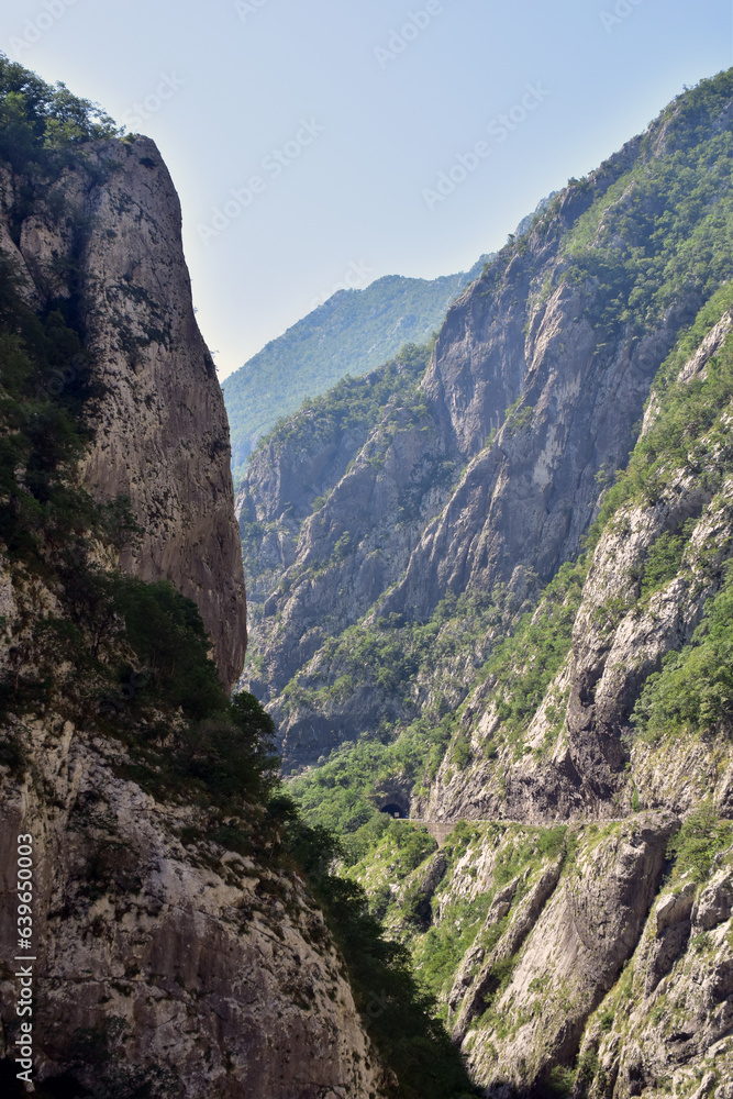 Sunny day in canyon Moraca, Montenegro. River and deep canyon. Nature scenery.