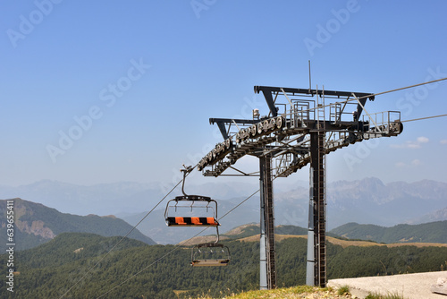 Chairlift in summer on mountain. Ski resort in Montenegro. Travel destination for holidays.