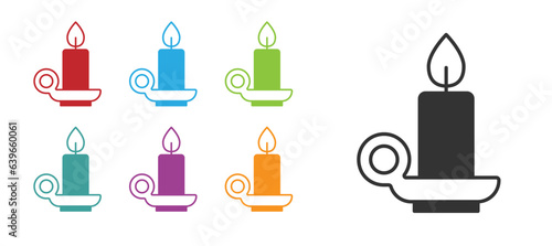 Black Burning candle in candlestick icon isolated on white background. Cylindrical candle stick with burning flame. Set icons colorful. Vector