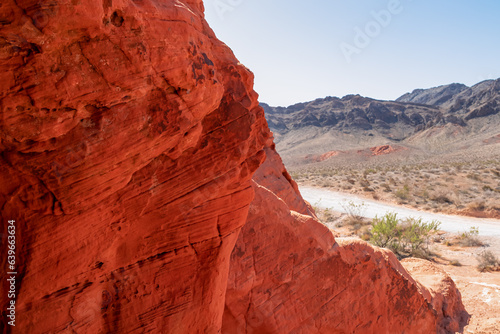 Interior view of windstone arch or fire cave in Valley of Fire State Park in Mojave desert near Las Vegas, Nevada, USA. Unique red Aztek sandstone rock formation in remote location. Good light