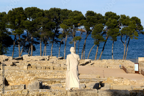 the afternoon in the  ruins of Empuries, Sculpture of Asklepios, La Escala, Girona province, Catalonia, Spain photo