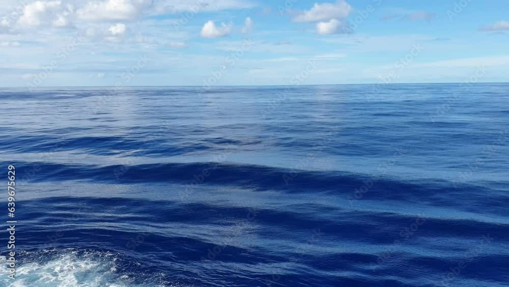 Blue sky with clouds in sunny weather over the ocean. Blue sky with clouds in sunny weather over the ocean.