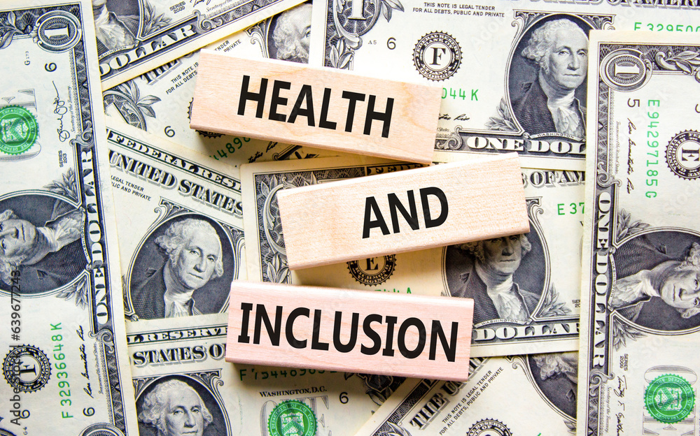Health and inclusion symbol. Concept words Health and inclusion on wooden block. Dollar bills. Beautiful background from dollar bills. Business motivational health and inclusion concept. Copy space.