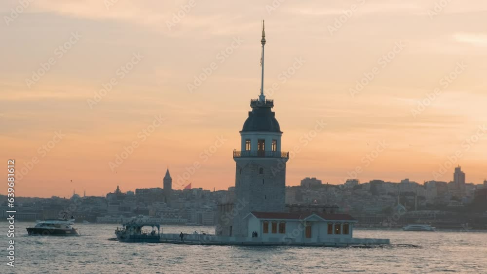 The Maiden's Tower in Bosphorus strait, Marmara sea, Istanbul, Turkey at sunset. Beautiful landscape with famous landmark on Asian part of the city The Maiden's Tower in Bosphorus strait, Marmara sea, Istanbul, Turkey at sunset. Beautiful landscape with famous landmark on Asian part of the city