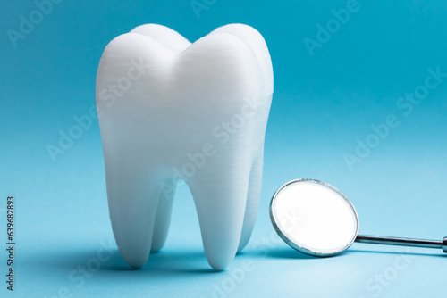 Tooth With Dental Mirror