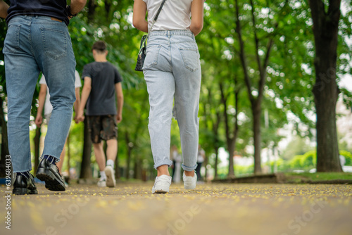 Students walking together on a sidewalk