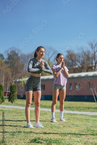 Sportsgirls saluting before training