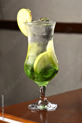 Refreshing Italian soda and lemon mojito drink with green apple Detox green juice Vegan healthy drink