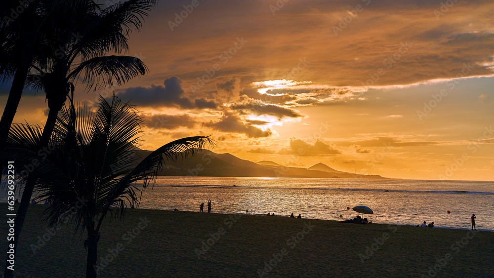 Sunset view at Playa de Las Canteras beach at Las Palmas de Gran Canaria, Spain
