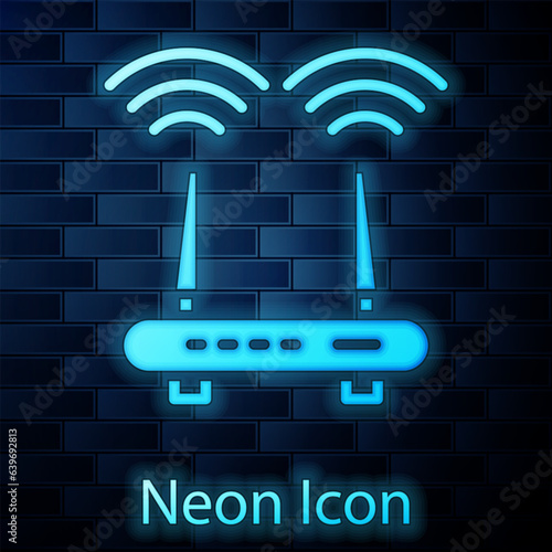 Glowing neon Router and wi-fi signal icon isolated on brick wall background. Wireless ethernet modem router. Computer technology internet. Vector