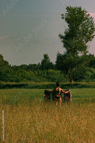 girl walkin in a field