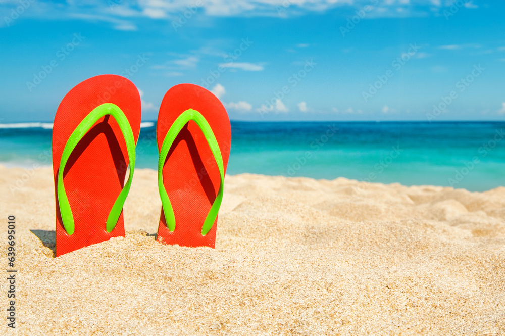 Holidays Background. Beach sandals on the sandy coast, Thailand