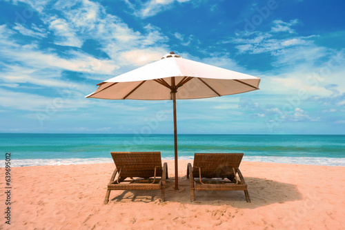 Beautiful beach. Chairs on the  sandy beach near the sea. Summer © Andrii Vergeles