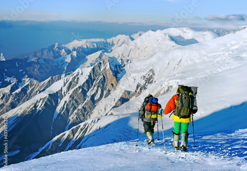 Two climbers descend from the summit of Everest in Nepal after a successful ascent.