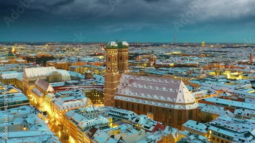 Munich frauenkirche church cathedral in city centre, munich city skyline germany winter snow marienplatz downtown.